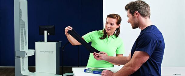 A phlebologist recommends the patient wear compression stockings